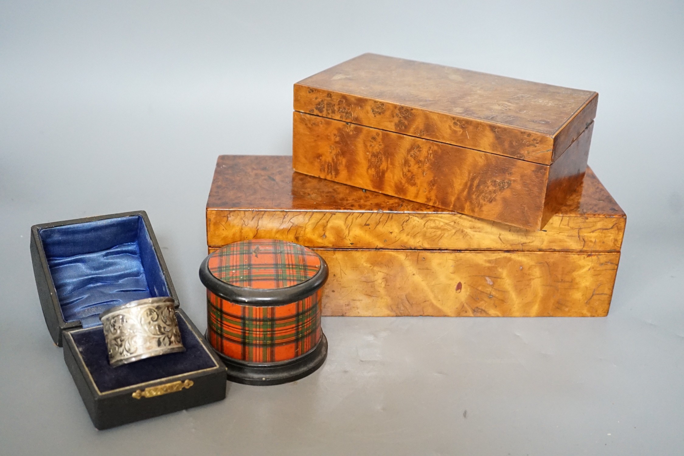 Burr walnut and parquetry box, burr yew box, tartanware box and cased silver napkin ring, tartan box 6.5 cms high